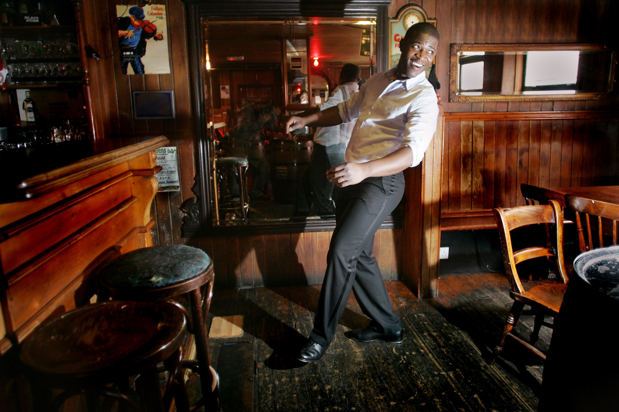 Tura Arutura dancing sean-nós on the wooden floor of a traditional Belfast pub